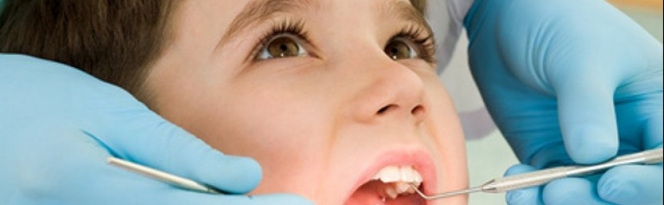 Ropień mózgu w następstwie infekcji pochodzenia zębowego u 11-letniego dziecka. Opis przypadku