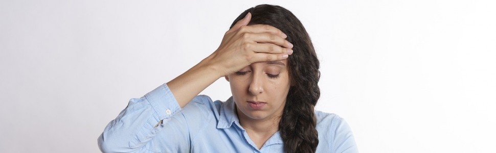 Migrenowe bóle głowy związane z zatrzymaniem trzeciego dolnego zęba trzonowego – opis przypadku